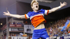 FC Cincinnati midfielder Jimmy McLaughlin reacts after winning the penalty shoot-out during a U.S. Open Cup soccer match in Cincinnati against the Chicago Fire.