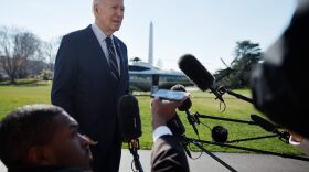 U.S. President Joe Biden talks briefly with reporters after returning to the White House in Washington, DC.