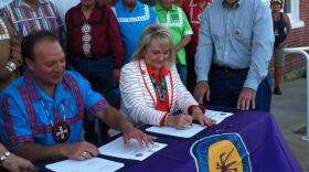 Gov. Mary Fallin signs vehicle tag compact with the Choctaw Nation.