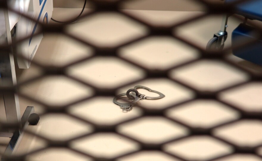 Metal cuffs lie on the floor of a medical facility at Guantánamo Bay, Cuba, in October 2018.