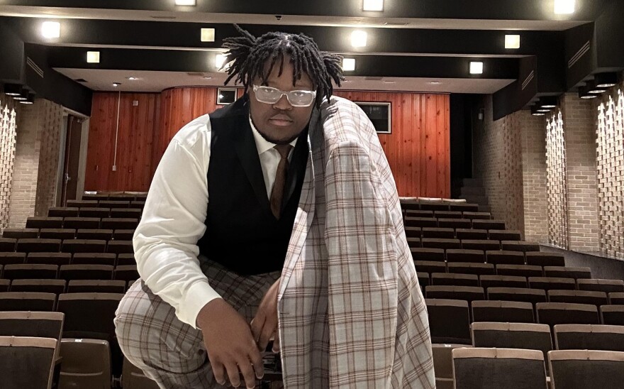 Judah White midshot in theatre seats