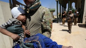 Medics from a U.S. group provided care for wounded civilians during the Iraqi government's offensive to retake the city of Mosul from ISIS.