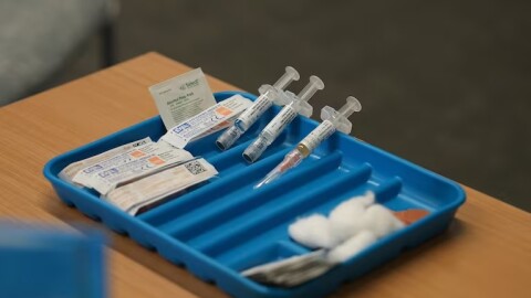 Syringes are prepared for the measles, mumps and rubella vaccine at a clinic in Lubbock, Texas, on Feb. 26, 2025.