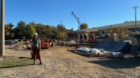 Roanoke parks project manager Katie Slusher stands before the new skatepark under construction in Wasena Park.