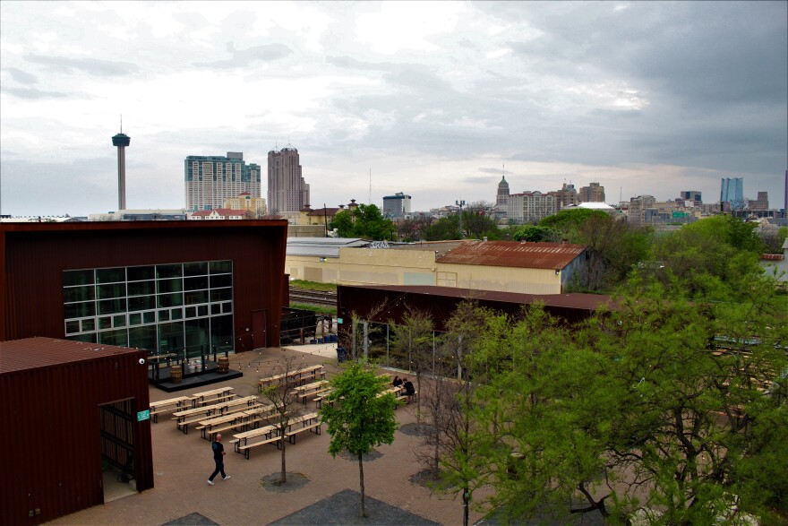 Customers keep their distance at the Alamo Beer Company courtyard.