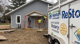 An instructor and students in the Arrowhead Economic Opportunity Agency's Youth Build program work Nov. 6, 2025, at the Itasca County Habitat for Humanity house in Cohasset.
