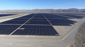 In this Dec. 11, 2017, file photo, solar arrays line the desert floor of the Dry Lake Solar Energy Zone as part of the 179 megawatt Switch Station 1 and Switch Station 2 Solar Projects north of Las Vegas. The Biden administration on Tuesday, Dec. 21, 2021, issued a solicitation for interest in developing solar power on public lands in Nevada, New Mexico and Colorado.