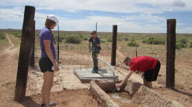 Ingram's students investigate a water source on the Navajo Nation.