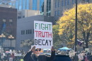 A protestor expresses his views at No Kings: Vote Early on Saturday, October 17, 2026.