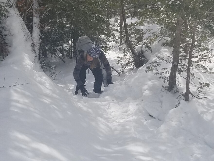 Emily Russell scrambles up another steep pitch.