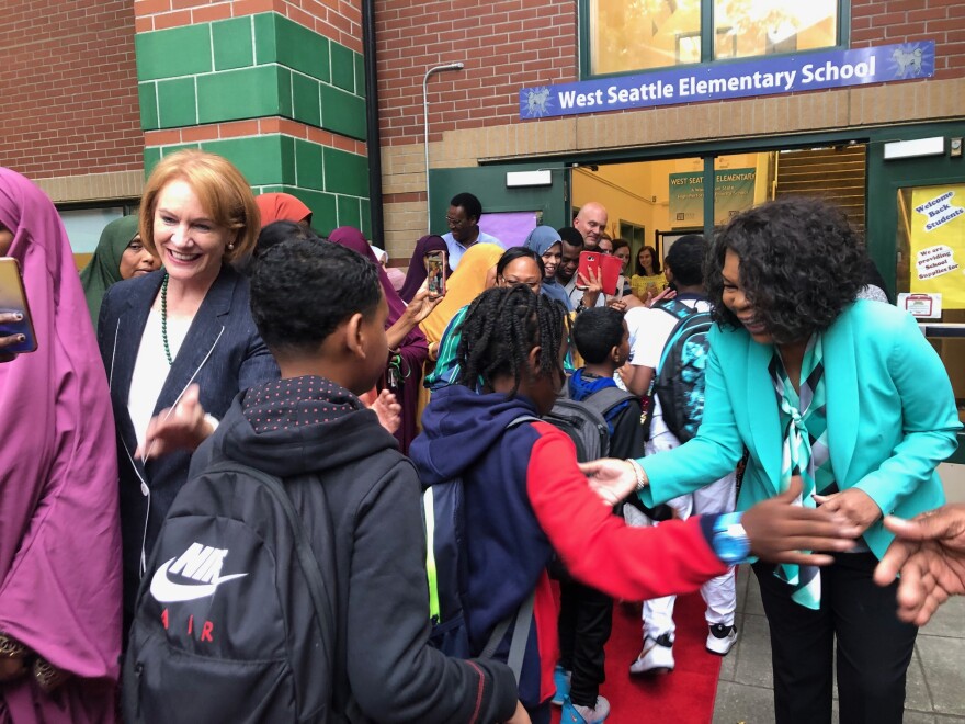 Seattle Mayor Jenny Durkan (left) and West Seattle Elementary School Principal Pamela McCowan-Conyers (right) greeted students on their first day of school. 