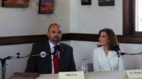 John Cox and Joy Hofmeister met to discuss public education Oct. 19 at Norman's Santa Fe Depot