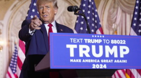 FILE - Former President Donald Trump gestures as he announces he is running for president for the third time as he speaks at Mar-a-Lago in Palm Beach, Nov. 15, 2022. Trump is set to kick off his 2024 White House bid with visits to a pair of early voting states. The appearances on Saturday, Jan. 28, 2023, will mark Trump's first campaign events since launching his bid more than two months ago. (AP Photo/Andrew Harnik, File)