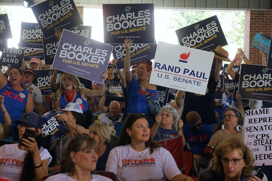 Republican and Democrat supporters show out, cheer and wave signs at the 2022 Fancy Farm Picnic.