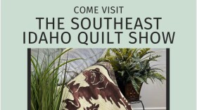 A poster advertising the Southeast Idaho Quilt Show. There is a brown and tan quilt pictured in the center of the image.