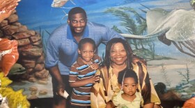 An old family photo of Trina and Martin Daniel, who died of COVID-19 within 24 hours of one another in July, with their children Myles and Marina, who were adopted by their cousins after their parents died. Myles and Marina are now teenagers. (Courtesy of the Daniel family) 