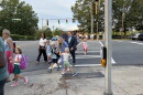Students and parents walk into Beverly Woods Elementary School on the first day of the 2026-27 school year.