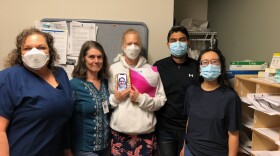 Employees of PeaceHealth Urgent Care have filed with the National Labor Relations Board to unionize. L to R: Linda McIntyre, Wendy Lang, Erin Reilly, Morgan Garvin, MD (on phone screen) Vivek Pantangi and Hong Le
