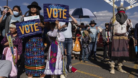 Navajos gather for a "Get out the vote" or GOTV march in a push for Native Americans to vote in the upcoming presidential election, on the Navajo Nation in Fort Defiance, Ariz., Saturday, Oct. 12, 2024. Logistical and legal obstacles have long stood in the way of Arizona's 420,000 Native citizens casting their vote.