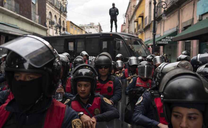 Police guard the Mexico City Congress in expectation of protests against judicial reform, Thursday, Sept. 12, 2024. (AP Photo/Felix Marquez)