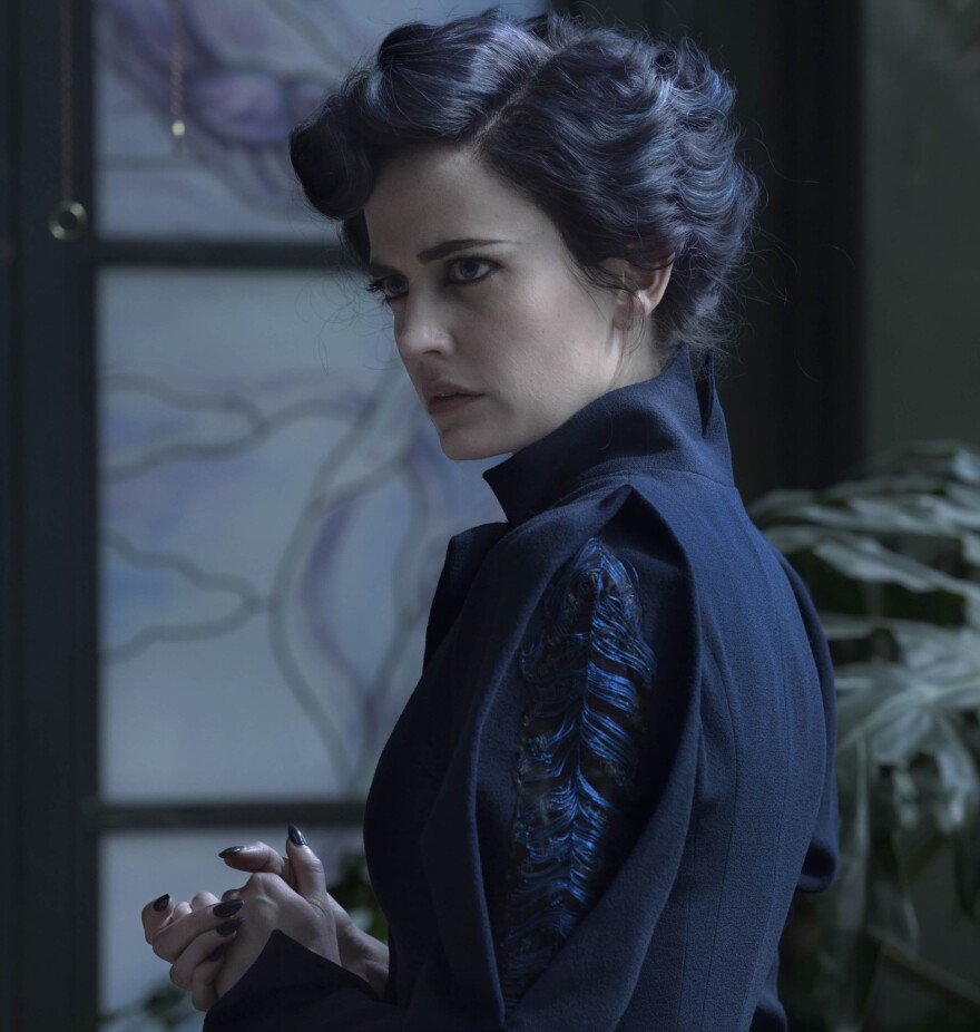 Atwood looked long and hard for the deep blue fabric in Miss Peregrine's dress. "I was looking for a blue that didn't photograph black," she says.