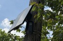 Close up of a Flock Safety Automated License Plate Reader camera in the University District, on E 11th Ave, facing east.