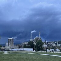 A mill and smokestacks