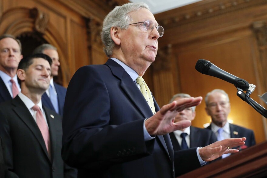 Senate Majority Leader Mitch McConnell, R-Ky., center, announces the Republicans' proposed rewrite of the tax code. (Pablo Martinez Monsivais/AP)