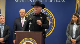 A man standing in front of a podium.