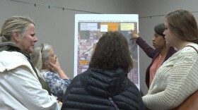 Franklin residents talk with officials at the Environmental Protection Agency about pollution coming from the Hougland Tomato Cannery at an open house in 2020. Residents suspect pollution from the cannery site as well as from the old Amphenol site could have cause rare child cancers in the area.