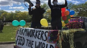 Wilmer Jimenez, associate Western NY coordinator for Rural & Migrant Ministry stands on the left next to Melina Draper with Finger Lakes Rapid Response Network in Geneva, NY.