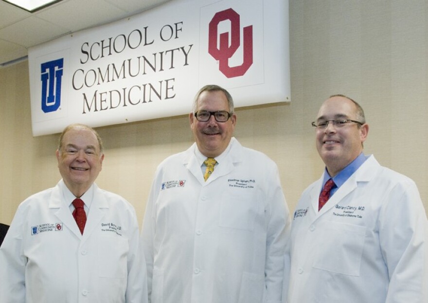 David Boren, Steadman Upham and Gerry Clancy at news conference announcement.