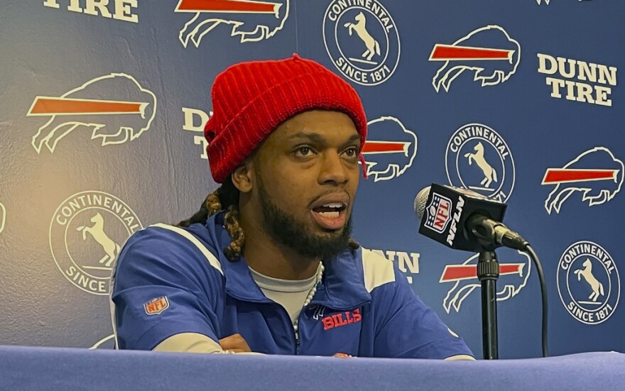 Buffalo Bills safety Damar Hamlin speaks to reporters at the NFL football team's facility in Orchard Park, N.Y., Tuesday, April 18, 2023, saying he plans to resume his football career after being cleared to play more than four months after going into cardiac arrest and needing to be resuscitated on the field during a game at Cincinnati.