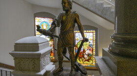 City Hall's replica of the "Cincinnatus" statue at Sawyer Point. Cincinnatus was a farmer turned solider in ancient Rome who came to stand for civic duty and virtue.