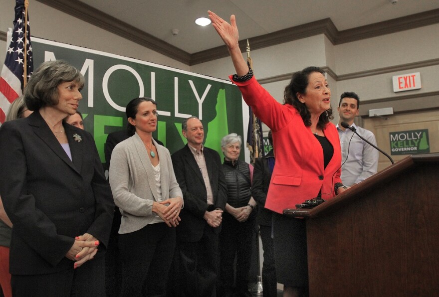 Molly Kelly celebrates her primary win at her campaign headquarters in Keene Tuesday. Kelly will face incumbent Chris Sununu in November.