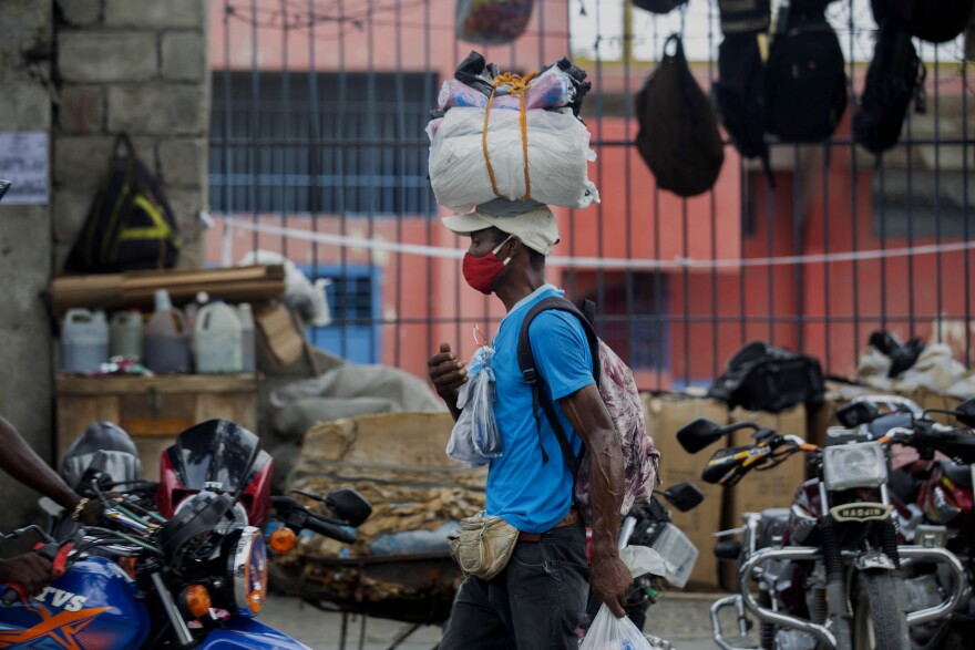 A street vendor was selling plastic bags last month in Port-au-Prince.