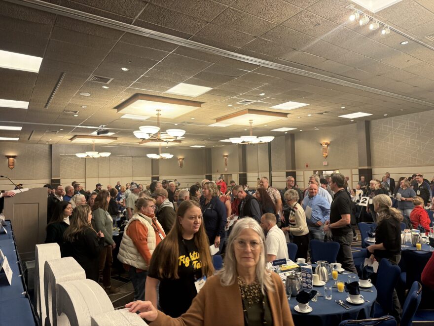 Trustees line up to vote for president-elect and vice president Friday morning.