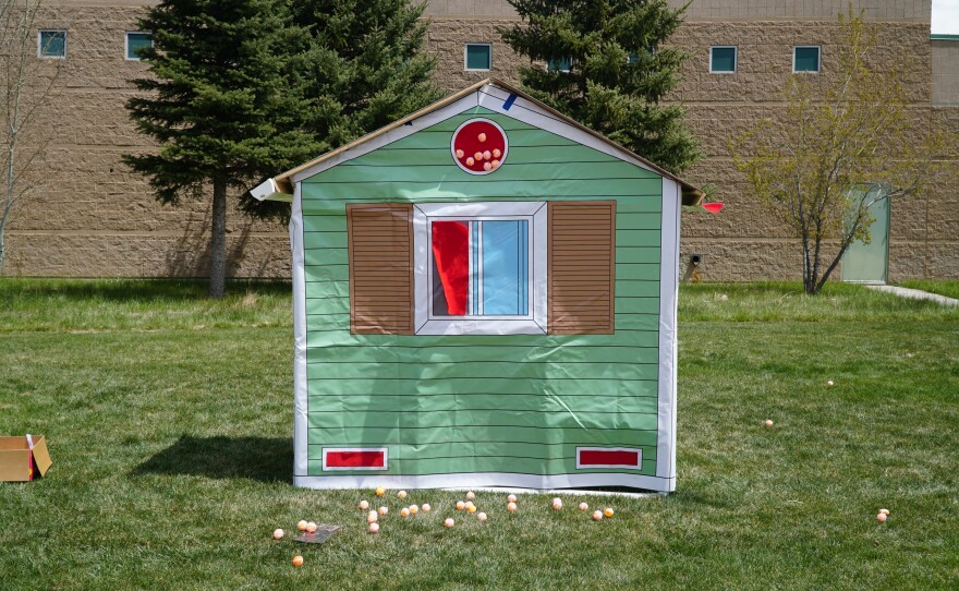 An "ember house" at the fair simulated how sparks might ignite a vulnerable residence.