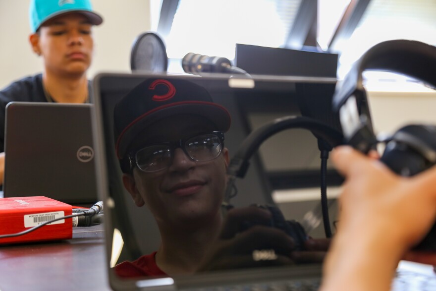 Students, cousins and podcast finalists Julian Fausto (right) and Eric Guadarrama in the Morton East Library where they recorded their podcast.