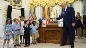 President Donald Trump rings the opening bell for the New York Stock Exchange and the Nasdaq in the Oval Office at the White House, Monday, July 6, 2026, in Washington.