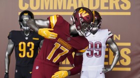 FILE - Washington Commanders jerseys are displayed at an event to unveil the NFL football team's new identity, Feb. 2, 2022, in Landover, Md. (AP Photo/Patrick Semansky, file)