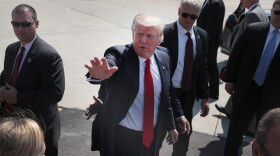 U.S. President Donald Trump greets guests after arriving at General Mitchell International Airport on June 13, 2017 in Milwaukee, Wis. (Scott Olson/Getty Images)