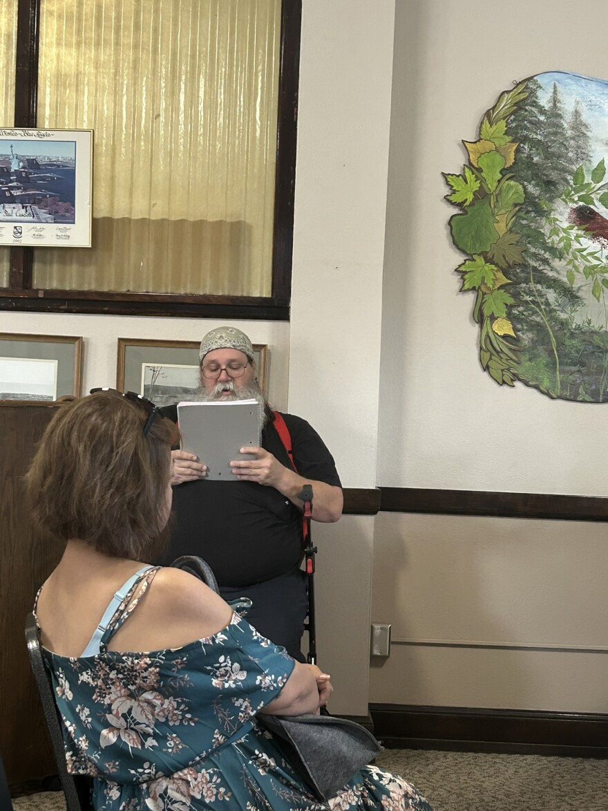 Steve Chouinard reads a prepared statement during the Aug. 5, 2026, meeting.