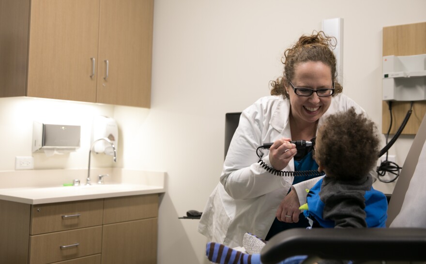 Nurse practitioner Rebecca Howard treats a child at SIUMedicine's clinic specifically for foster children.