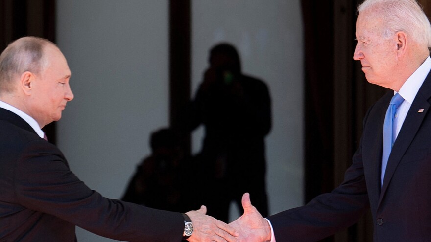 Russian President Vladimir Putin shakes hands with President Biden before a summit in Geneva on June 16, 2021.