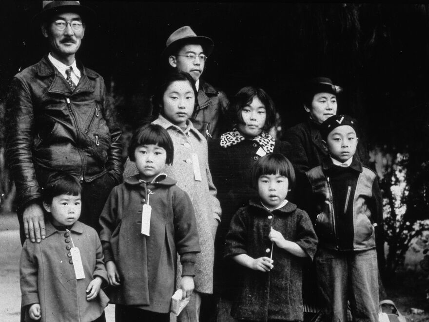 Members of the Japanese-American Mochida family await relocation to a camp in Hayward, Calif.