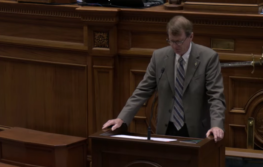 Man at lectern