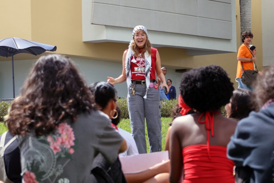 FIU's YDSA co-chair Lael Licht speaks to student demonstrators at a protest of the university's involvement with contractors involved in the Israel-Hamas War outside of the Graham Center on Oct. 9, 2025.