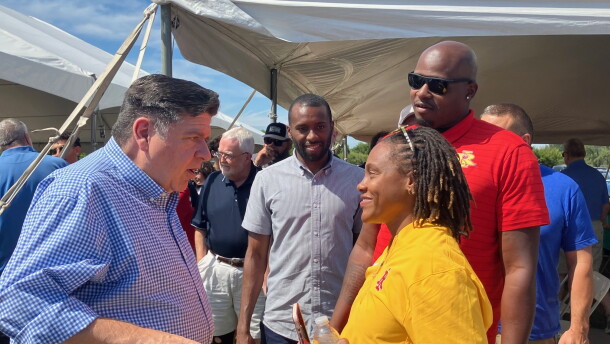 Illinois Gov. JB Pritzker meets Shavonne Singleton of Rock Island and her husband Demetriyone at the annual Rock Island County Democrats' Salute to Labor picnic in East Moline, Monday, Sept. 7, 2026.