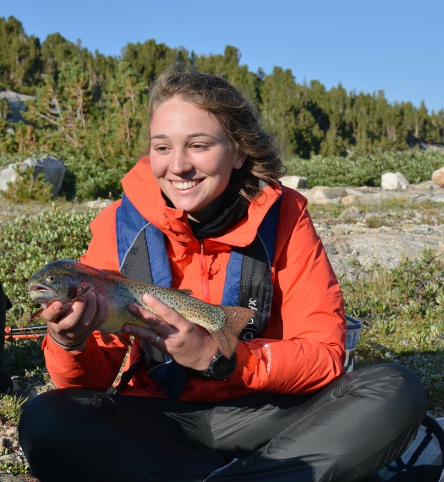  Head researcher Lucia Combrink examines a trout.